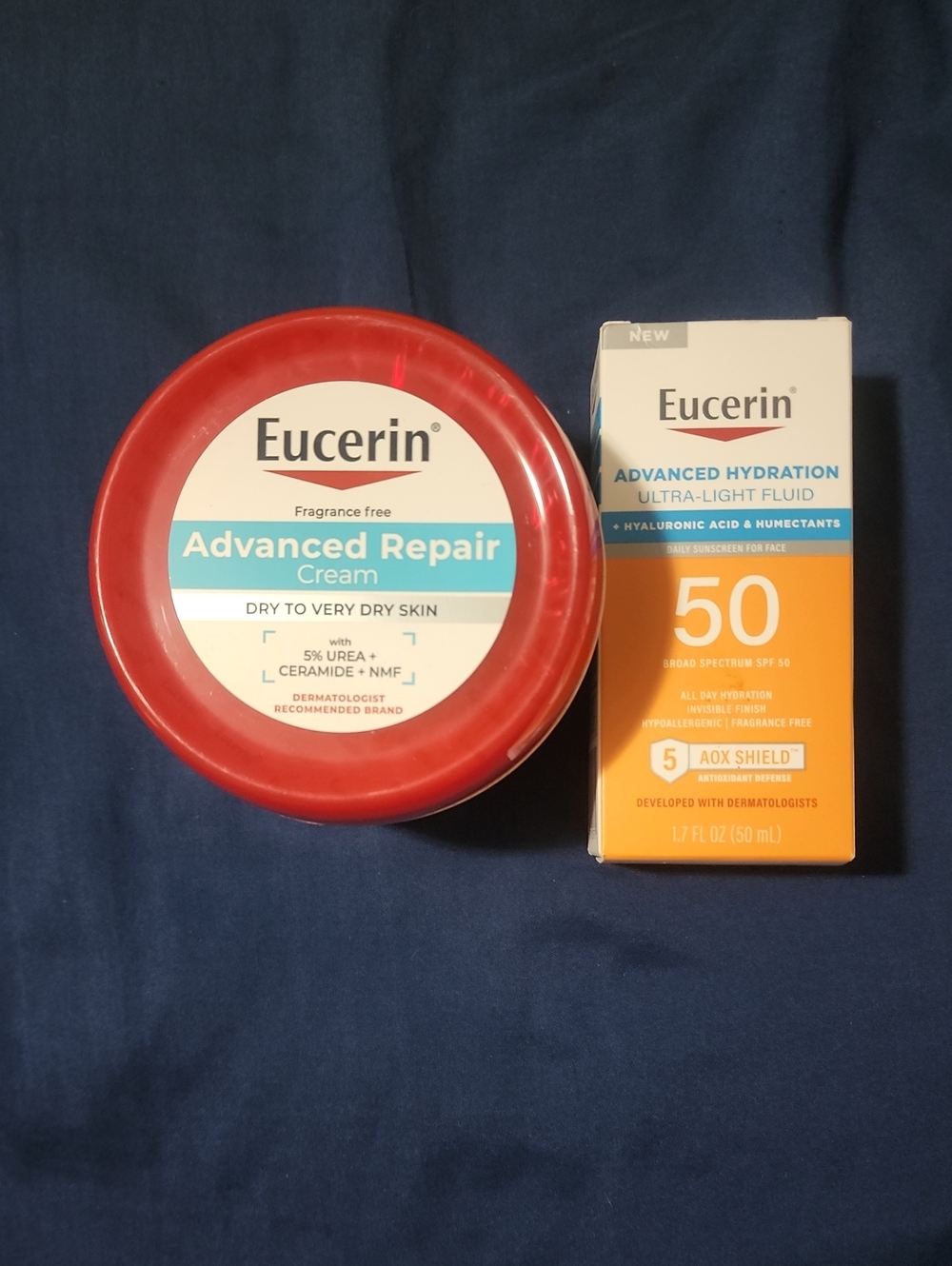 2 eucerin Advanced Repair Cream & Advanced Hydration SPF 50 - White/Orange